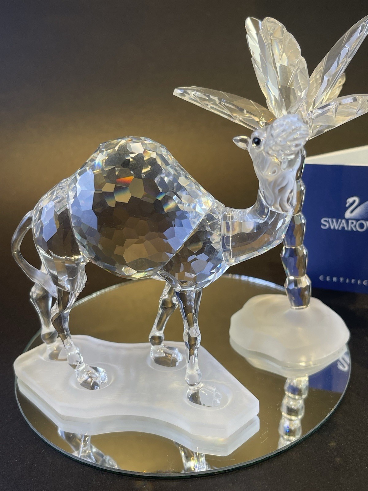 swarovski,stately camel and palm tree,boxes, certifs,mint