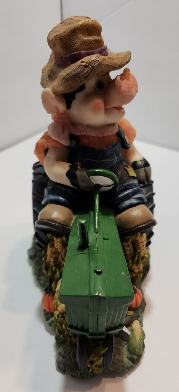 Jenkins Figurine 50737 Farmer Cow On A Green Tractor