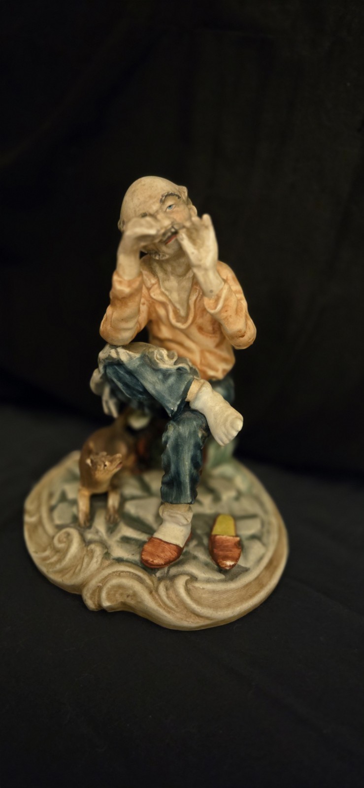 Vintage Portugal Porcelain Bisque Figurine Seated Old Man Mending Sock with Dog