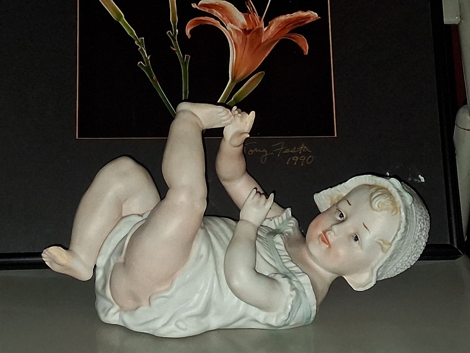 Gebruder Heubach-German Porcelain Bisque-Lying On Back Piano Baby–11″ Length