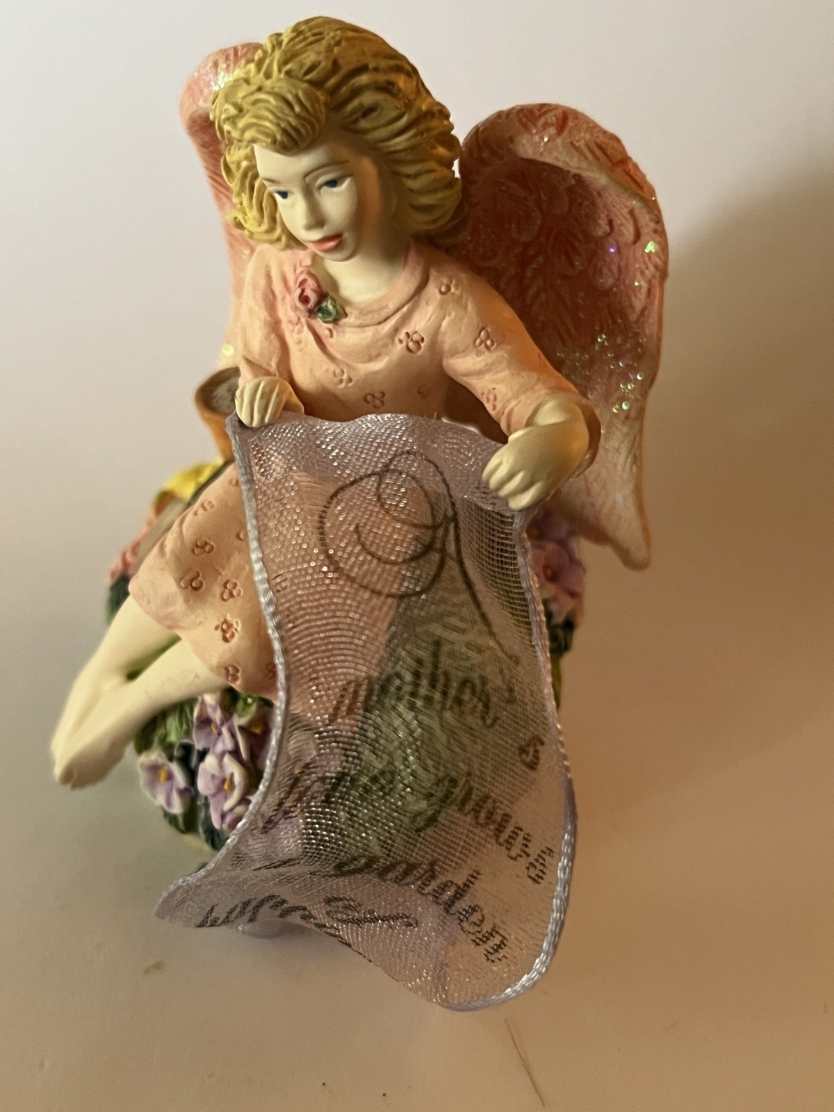 A mother’s love grows a garden of happiness – figurine angel 2 1/2”