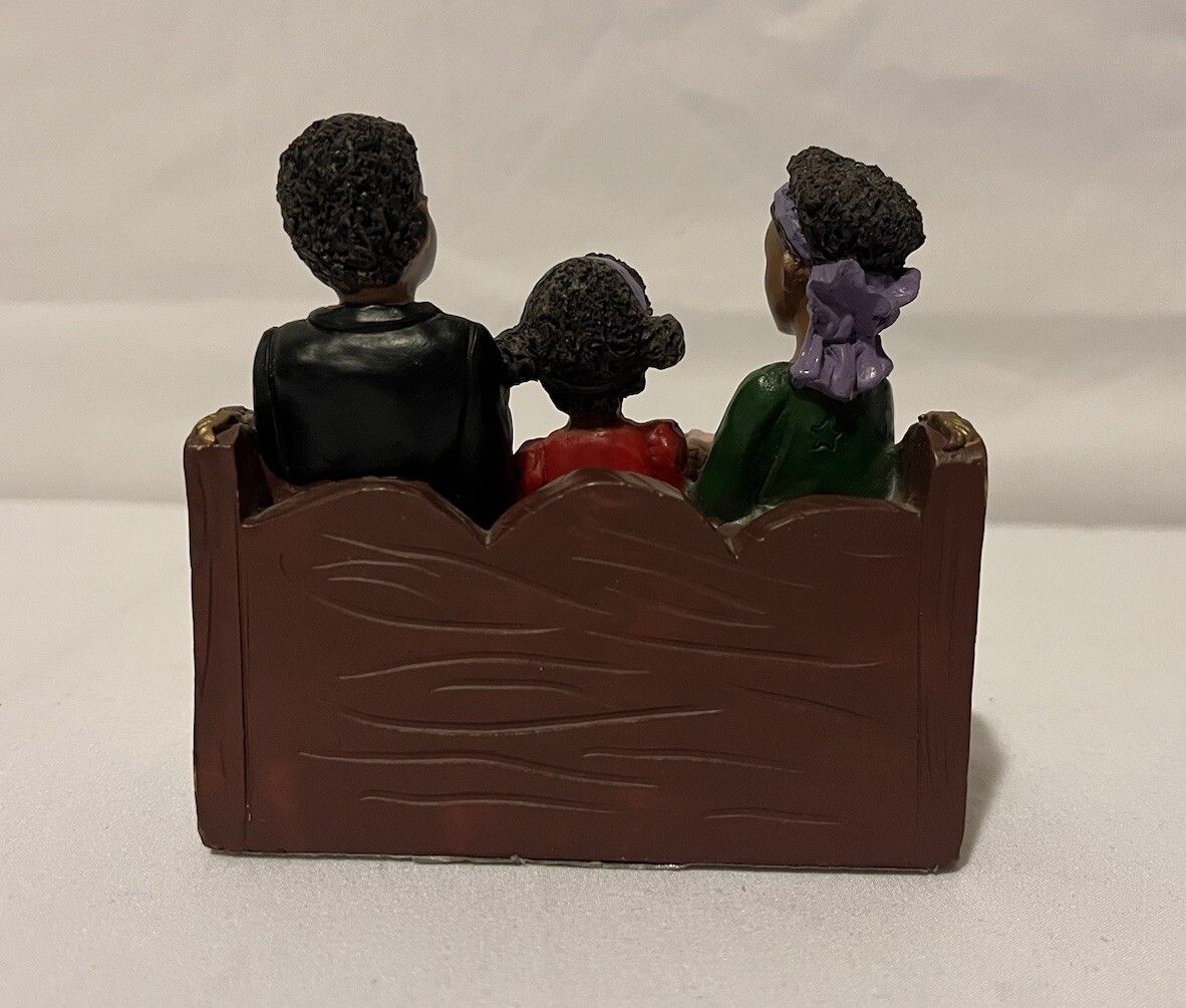 UTI The Church Collection African American Family Of 3 sitting on a Church Pew