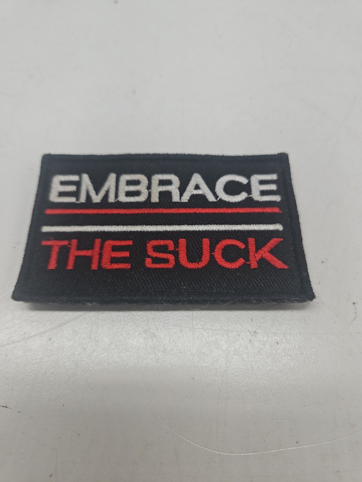 Embrace The Suck Embroidered Patch Hook & Loop Backing 2×3