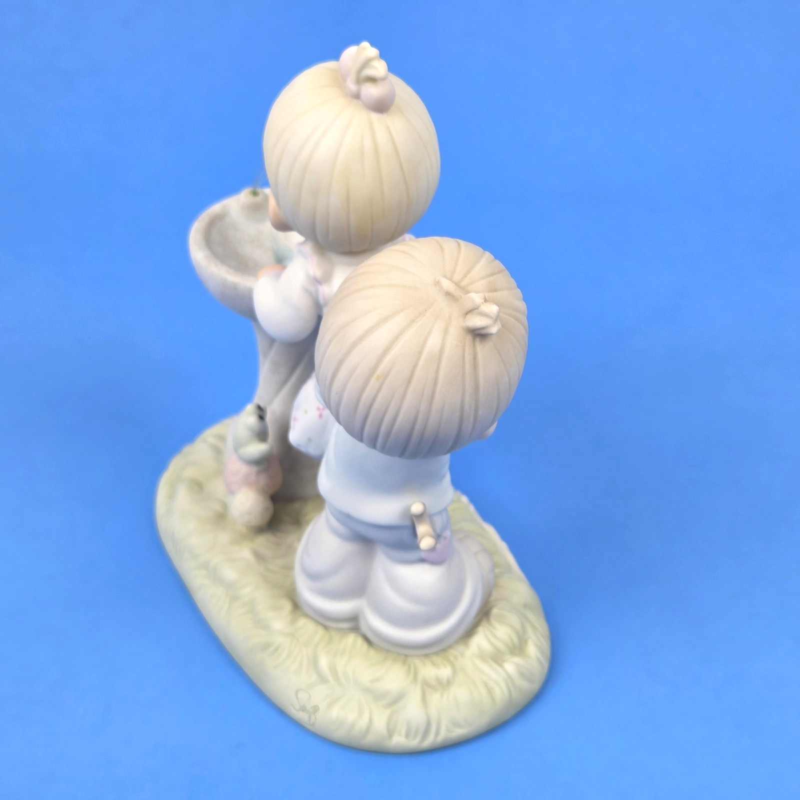 Precious Moments “Your Love Is So Uplifting” Figurine