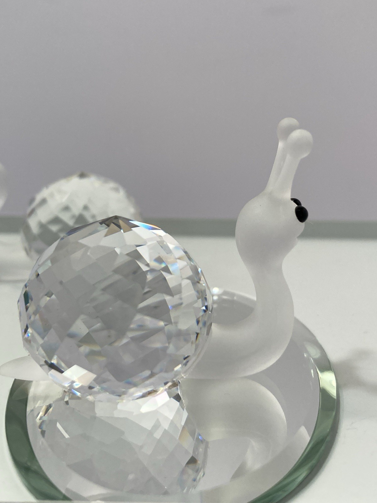 swarovski crystal small snail figurines (2)