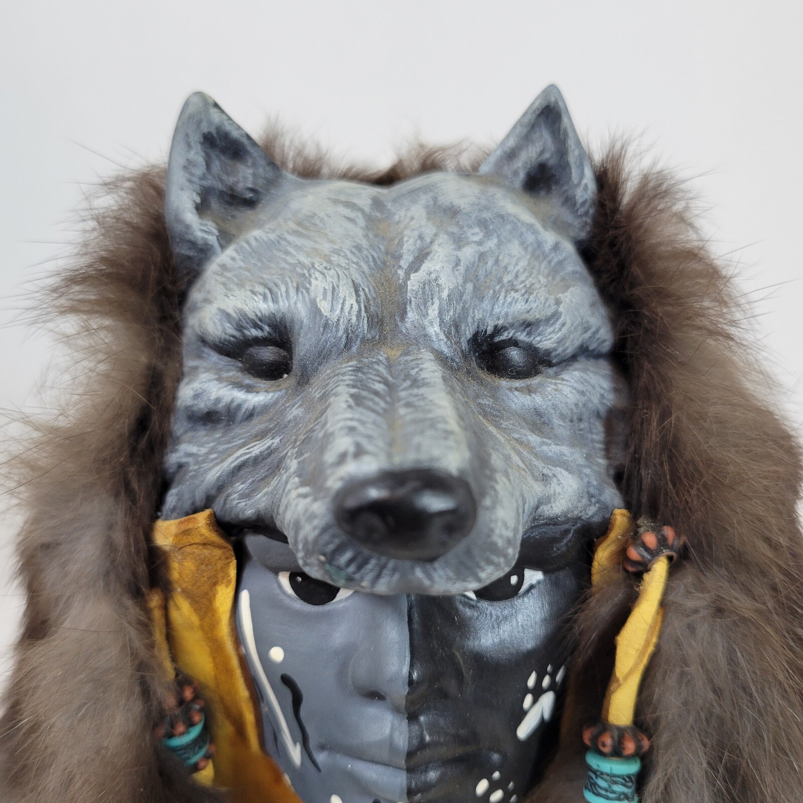 Indigenous tribal bust wolf headdress ceramic fur lining statue leather tassles
