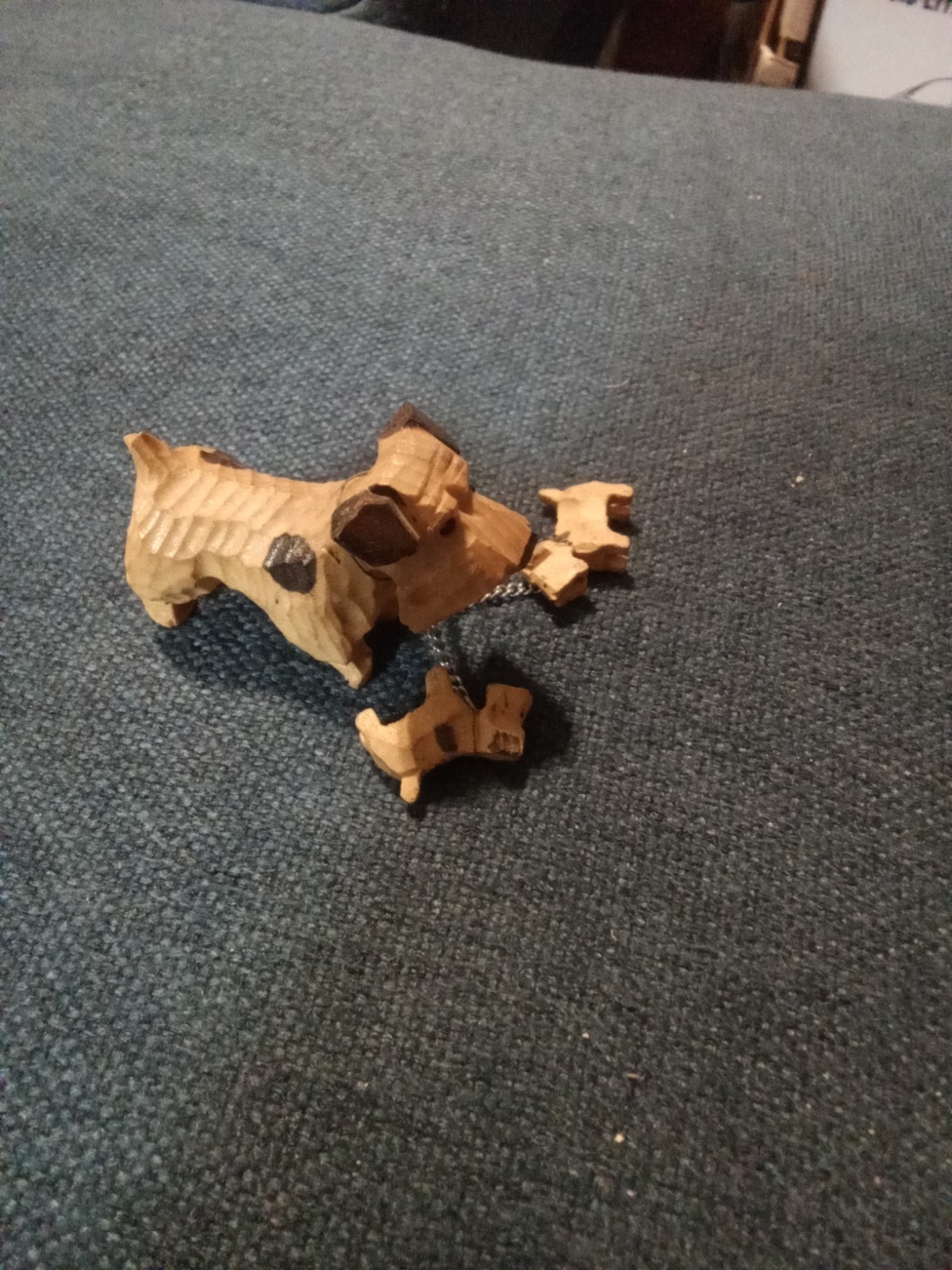 minature wooden schnauzers on chain figures
