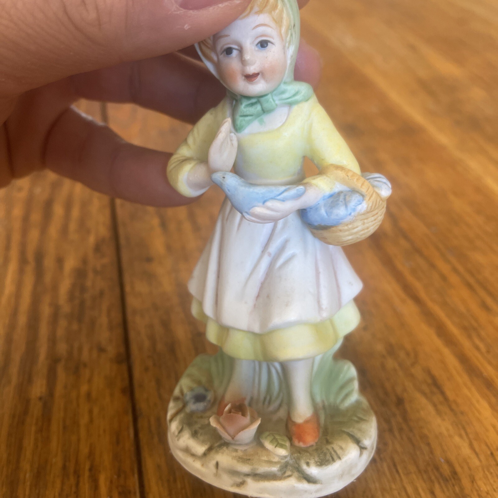 Porcelain Figurine Woman Holding Basket With Bird In Hand Flowers On Base