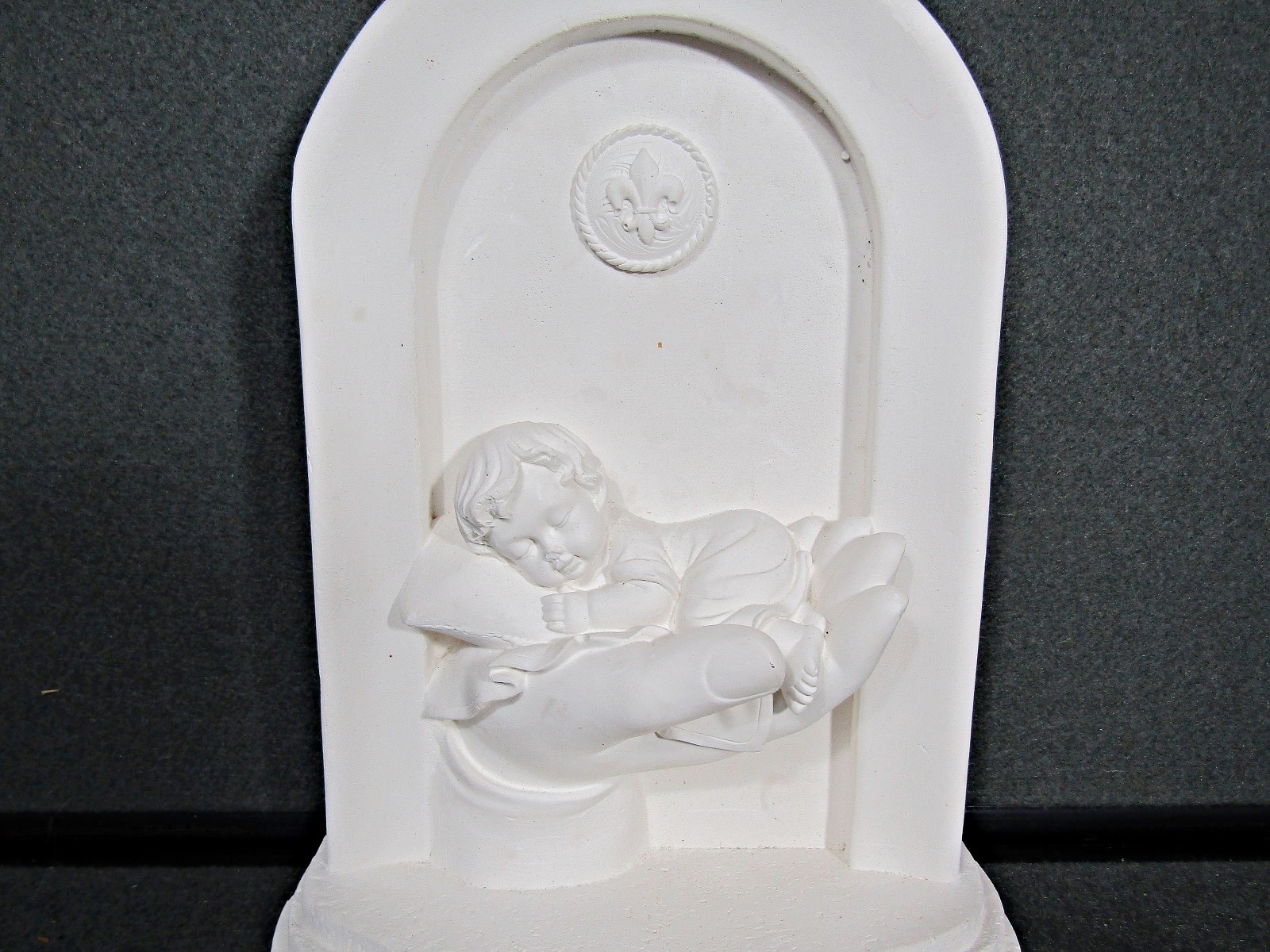 Sleeping Baby in Guardian Hand White Plaster Statue Freestanding 10”