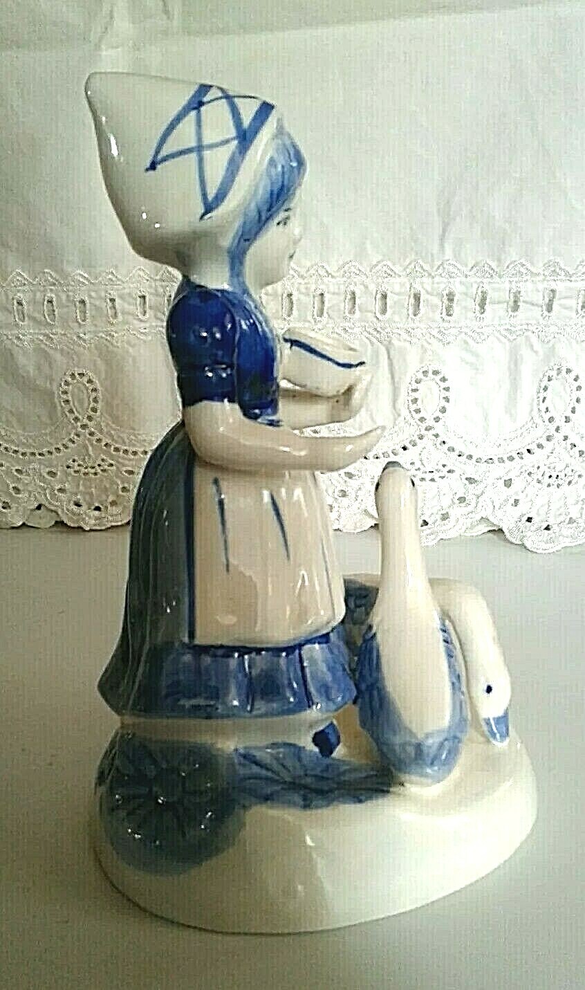 DELFT MAIDEN FEEDING GEESE, 7 INCHES TALL, 3 1/2 INCHES WIDE