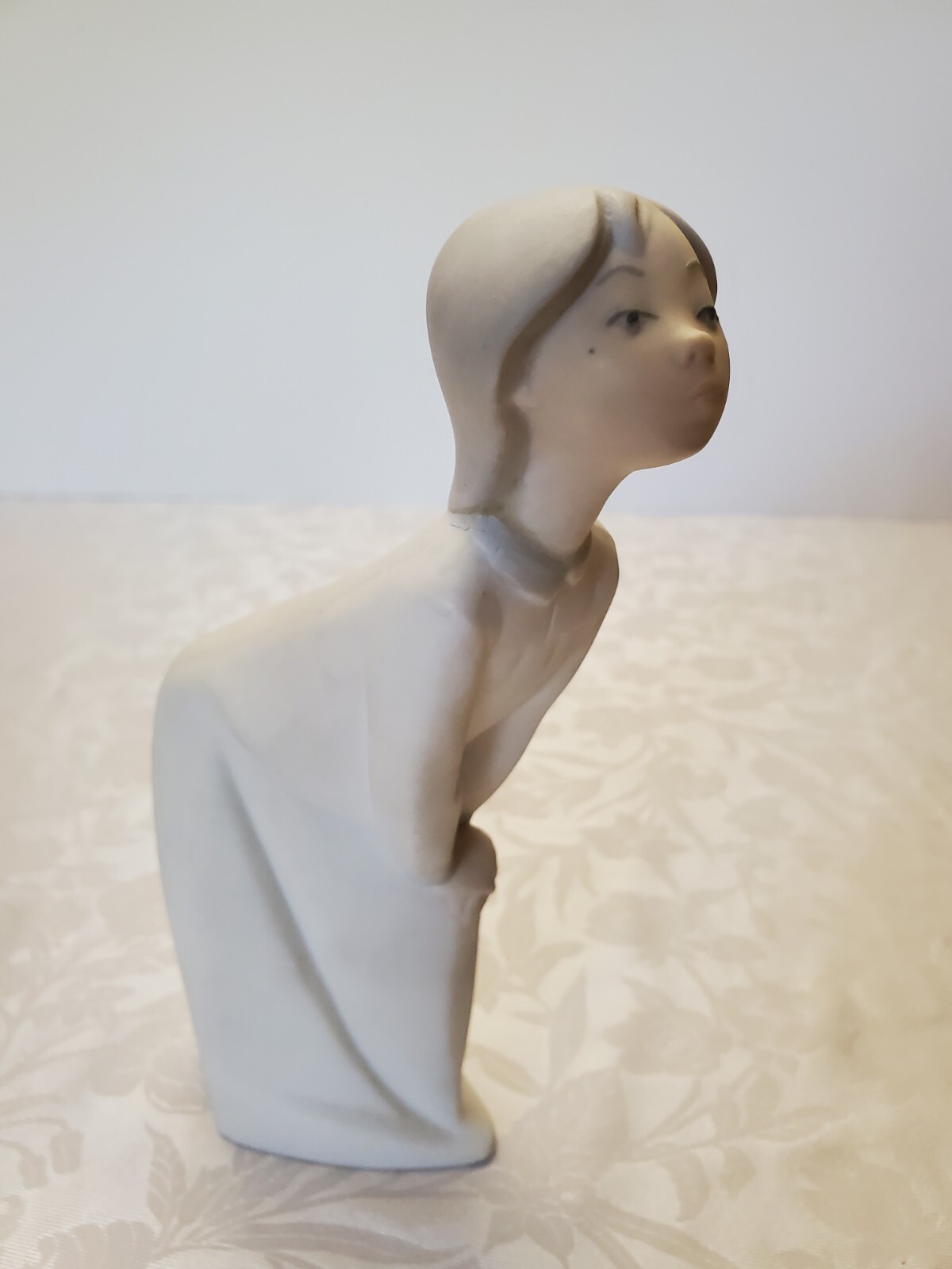 Lladro Kissing Girl in Nightgown / Pajamas, Porcelain, Unglazed Matte Finish