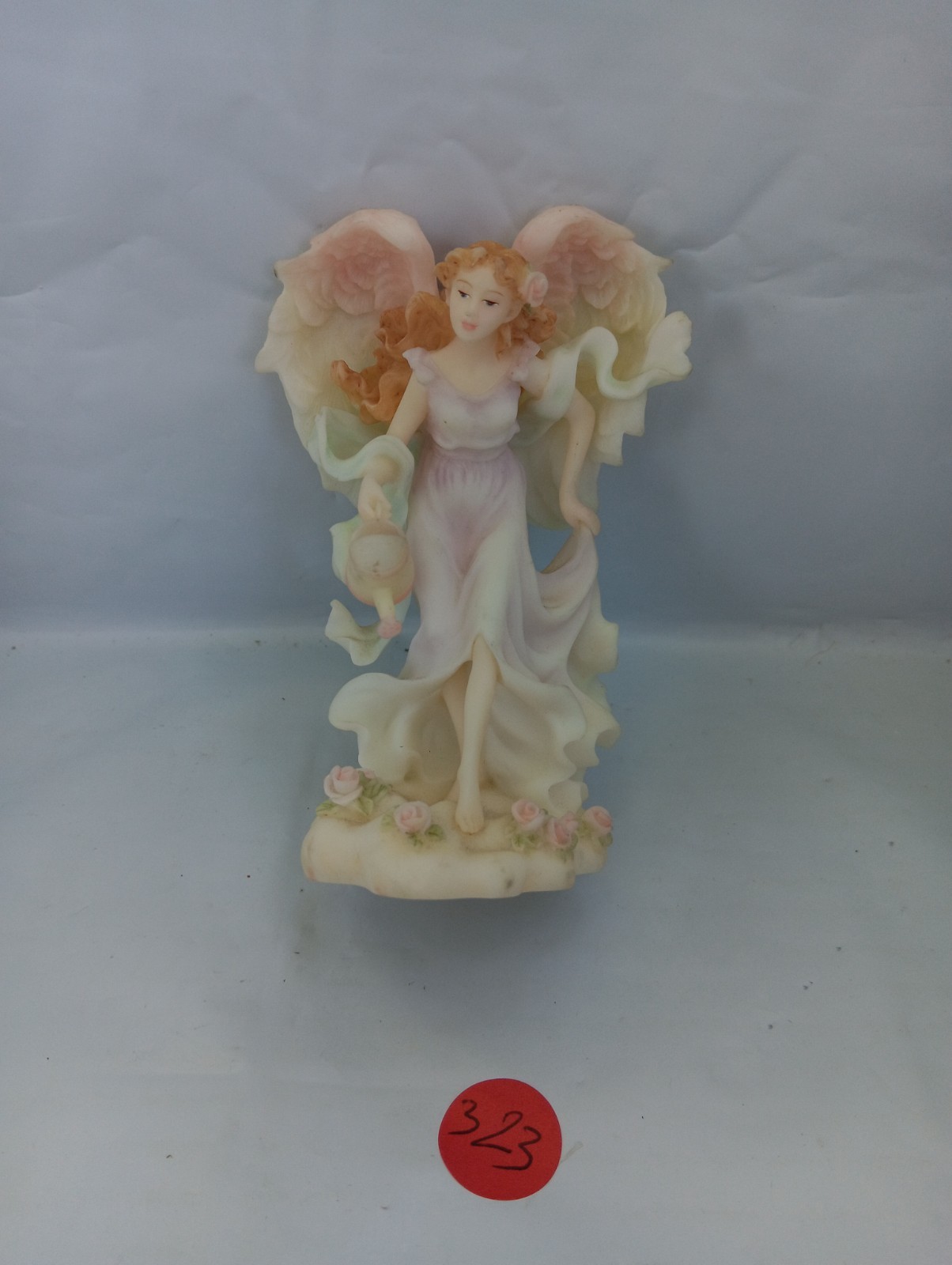 Seraphim Angel of the Month Series “April” 5 inches #81814 watering flowers