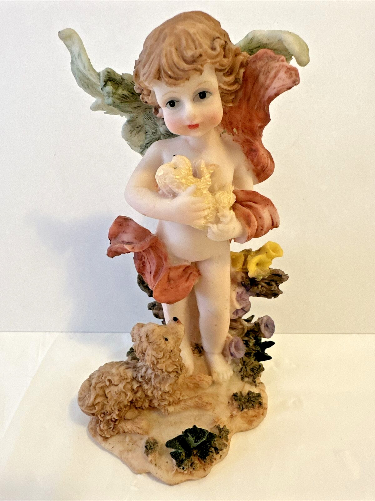 Vintage Cherub Figurine 5.5″ Holding Puppy and Mama Dog At Feet in Floral Garden