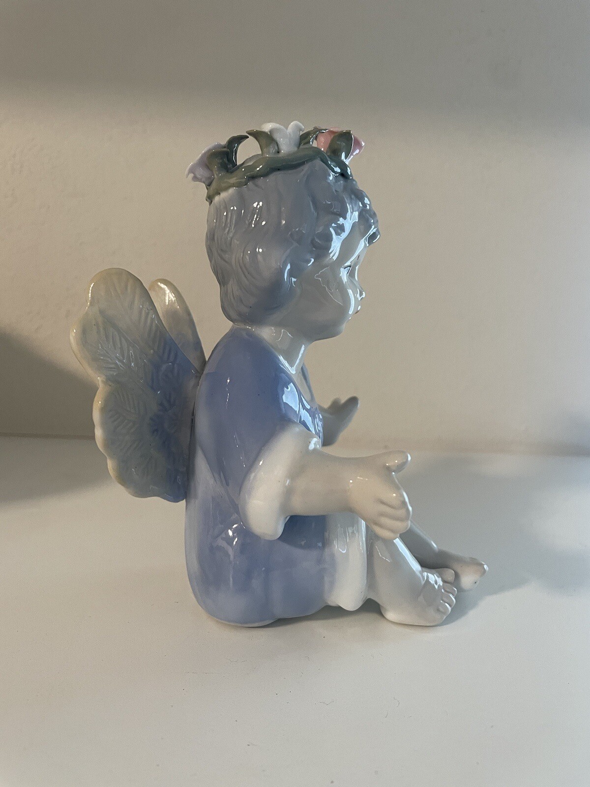 Glazed Porcelain Cherub Angel Boy 5” Tall, sitting. In great condition.