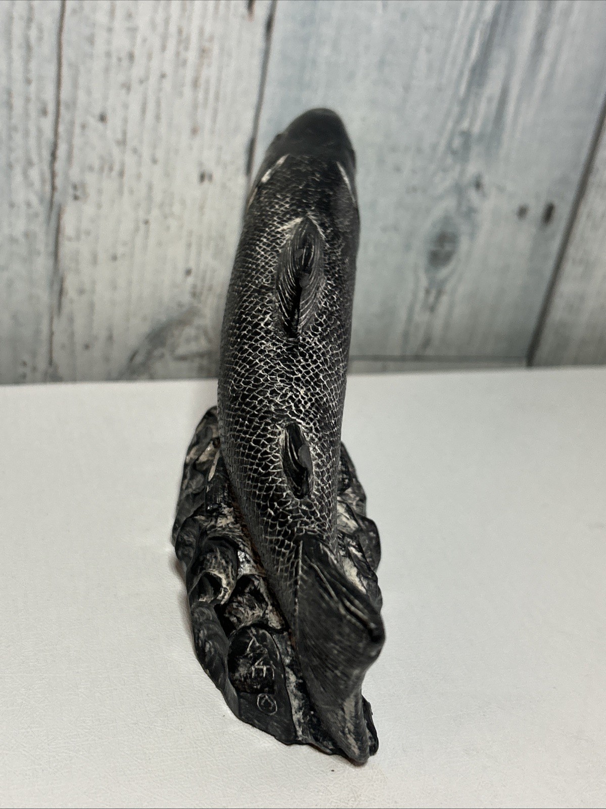 WOLF ORIGINAL SALMON SOAPSTONE FIGURINE, SIGNED WE, HAND MADE IN CANADA