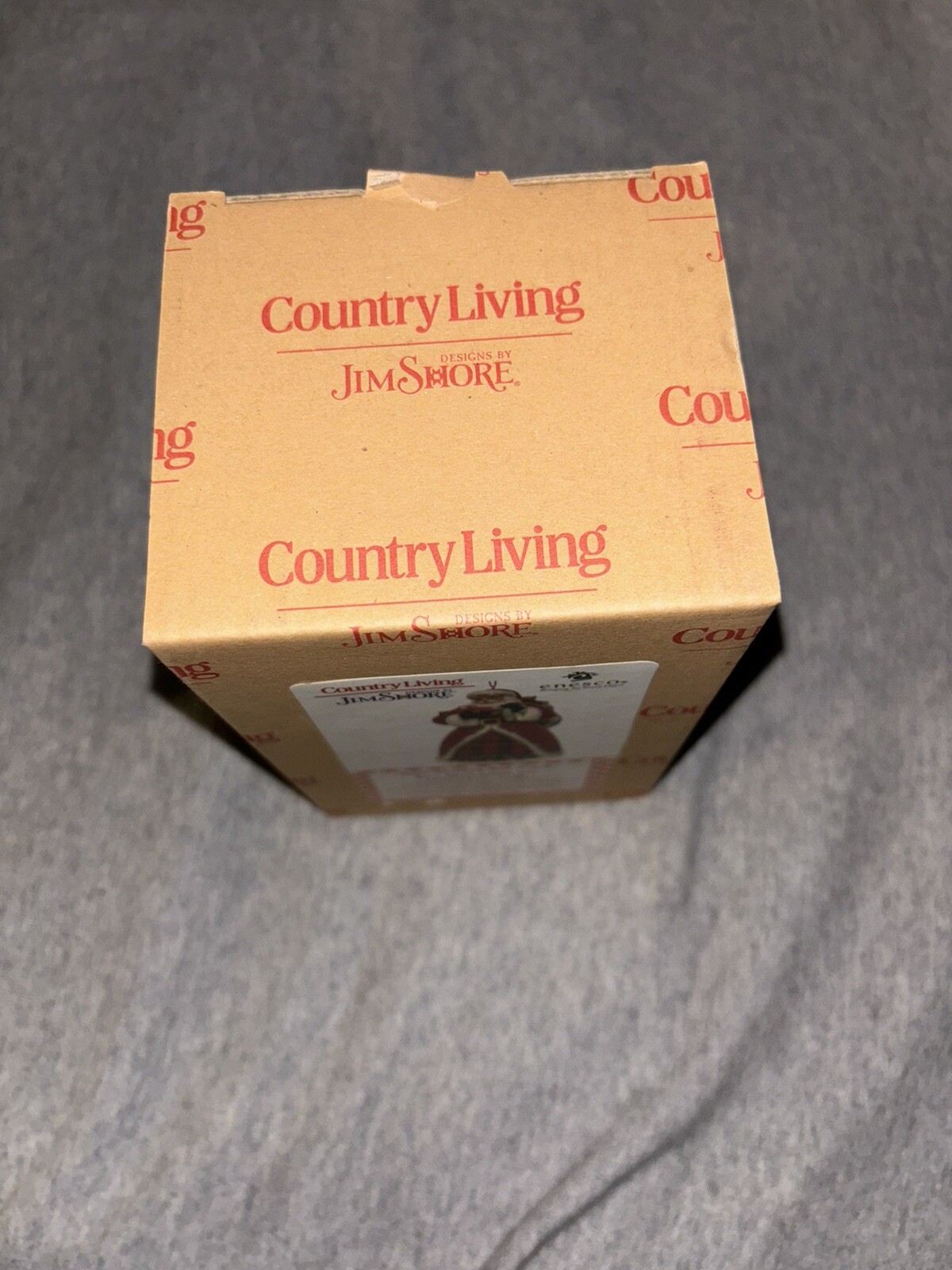 Country Living by Jim Shore – Santa Holding Red Truck Christmas Ornament 6011746