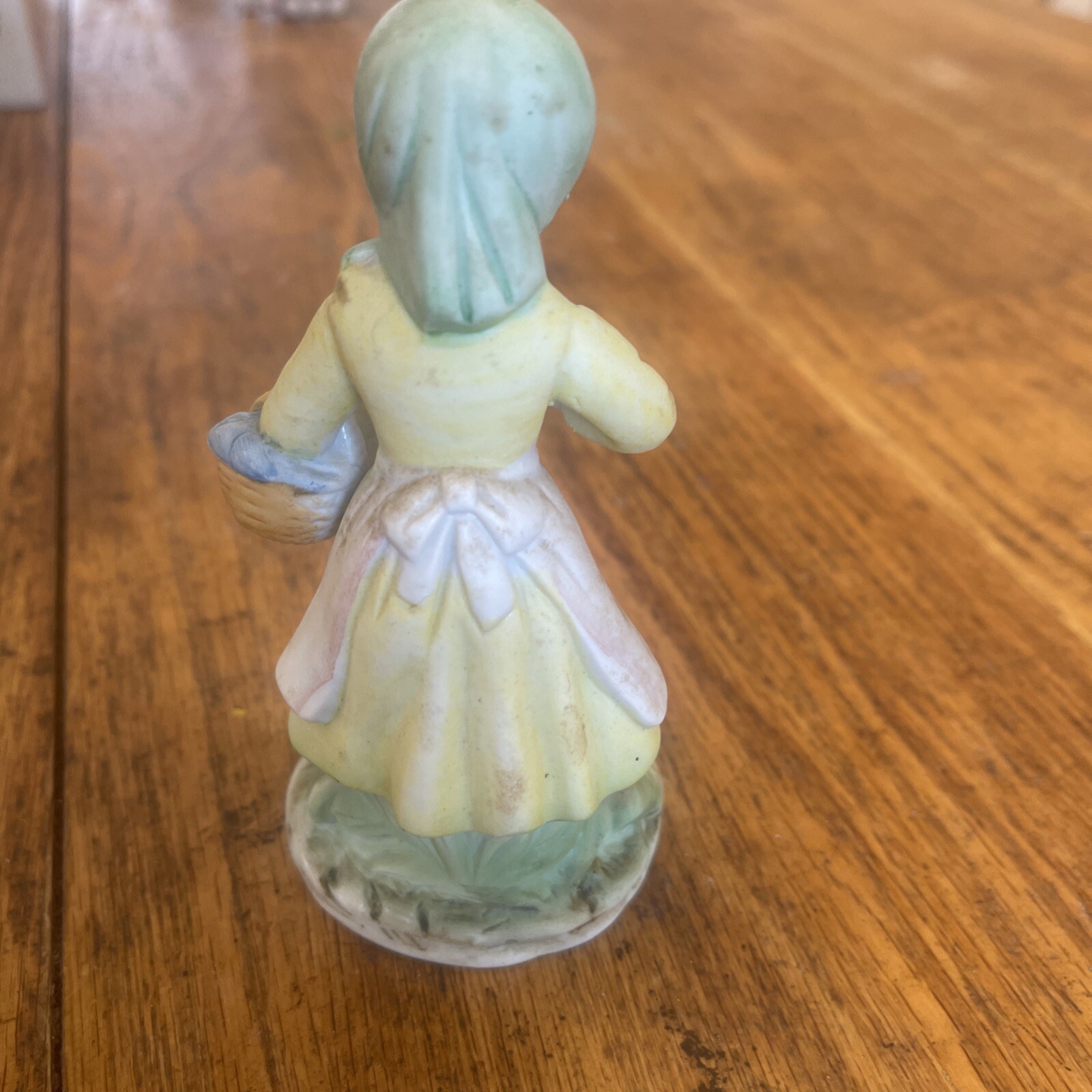 Porcelain Figurine Woman Holding Basket With Bird In Hand Flowers On Base
