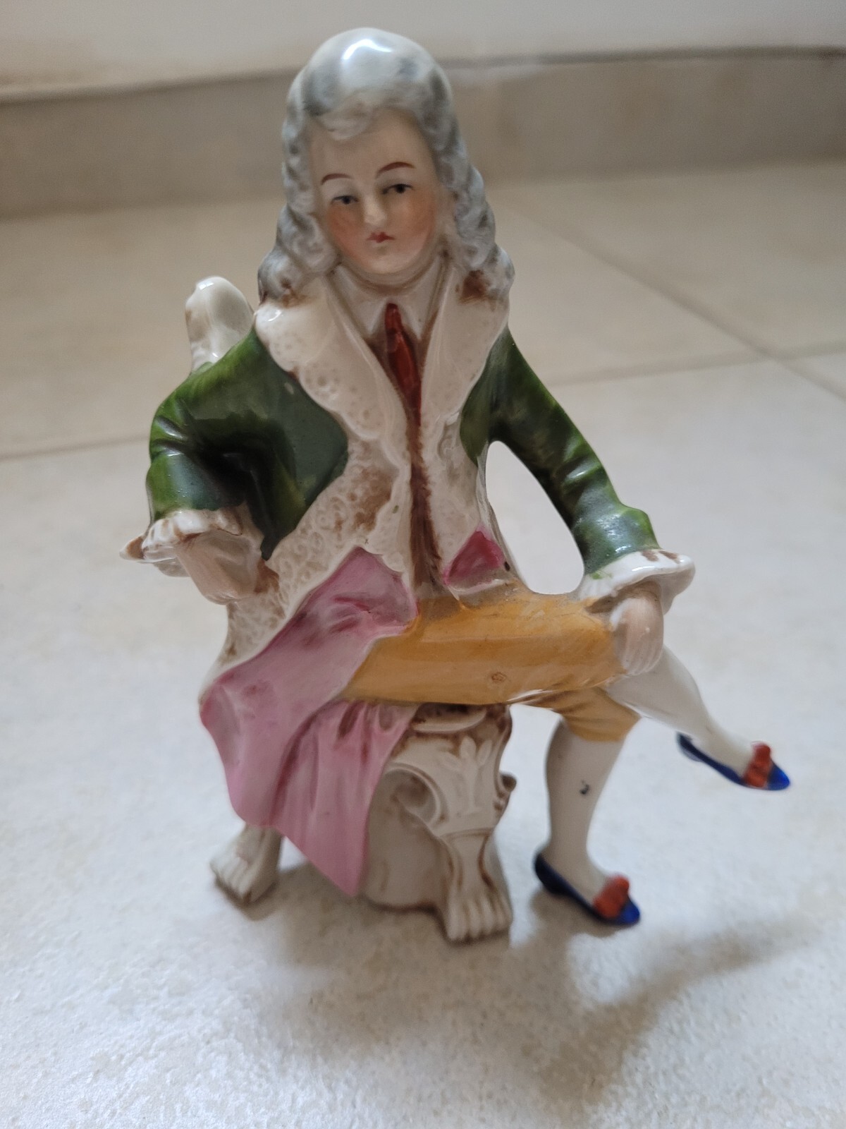 Rauenstein Germany Porcelain figurine sitting man 13 cm