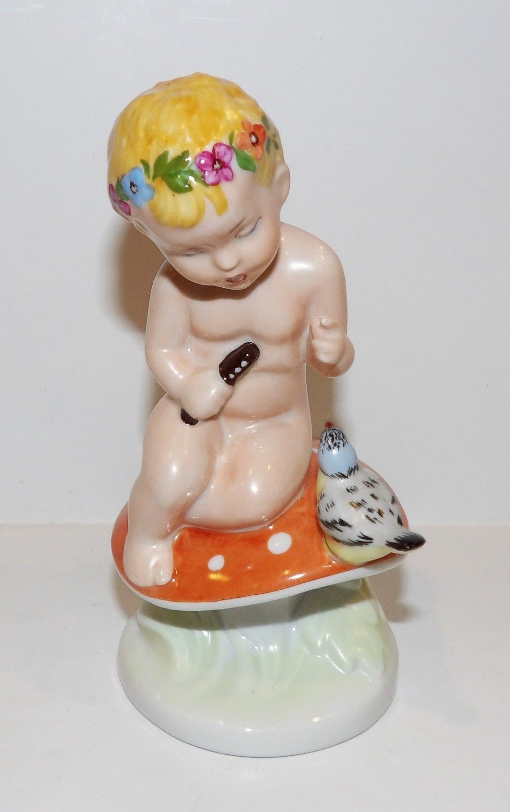 ROYAL DUX CZECH REPUBLIC BOY WITH FLUTE & BIRD ON MUSHROOM 6 5/8″ FIGURINE