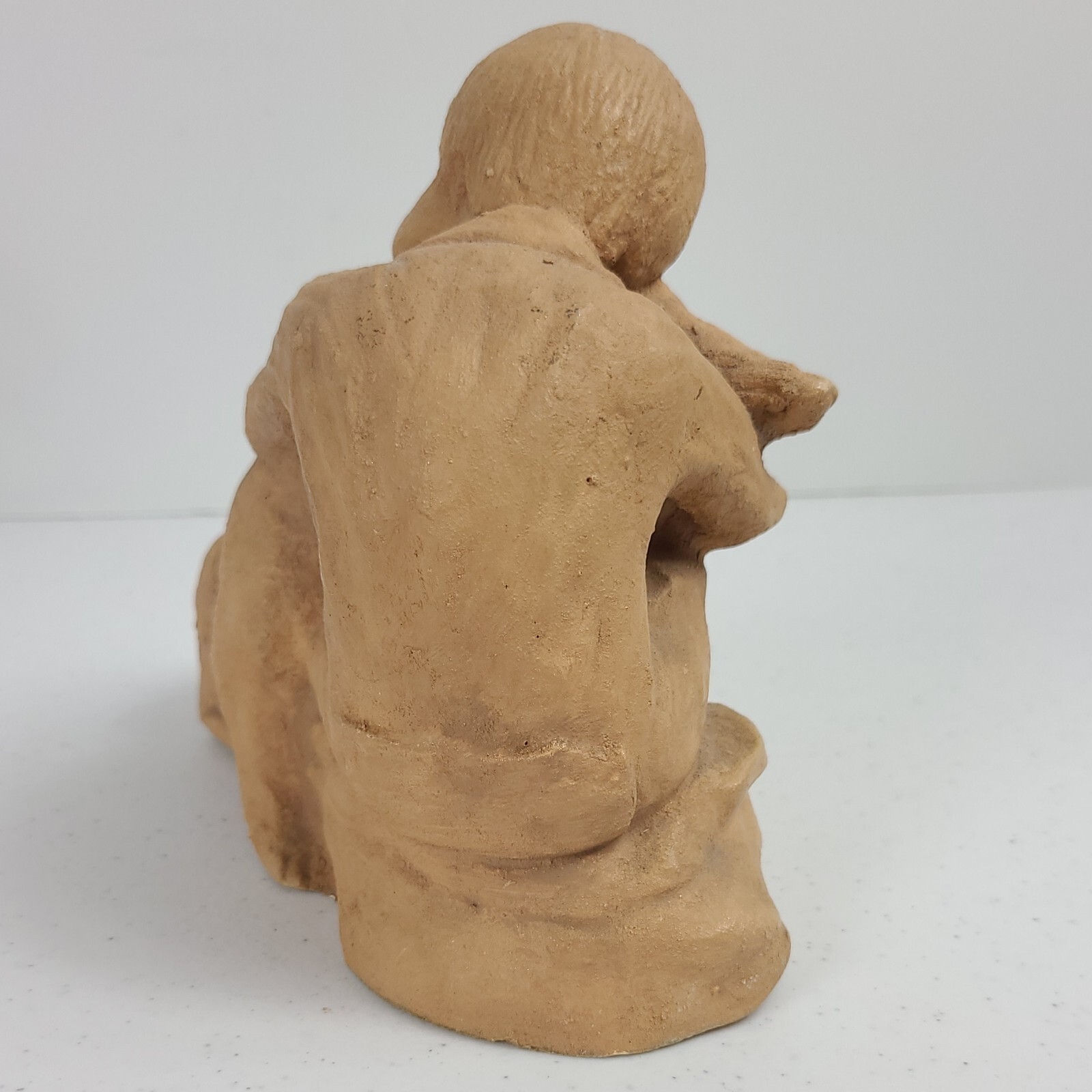 Boy and His Dog Figurine Approx. 5 3/4”H x 7″L Resin ? Painted Matte Sand Finish