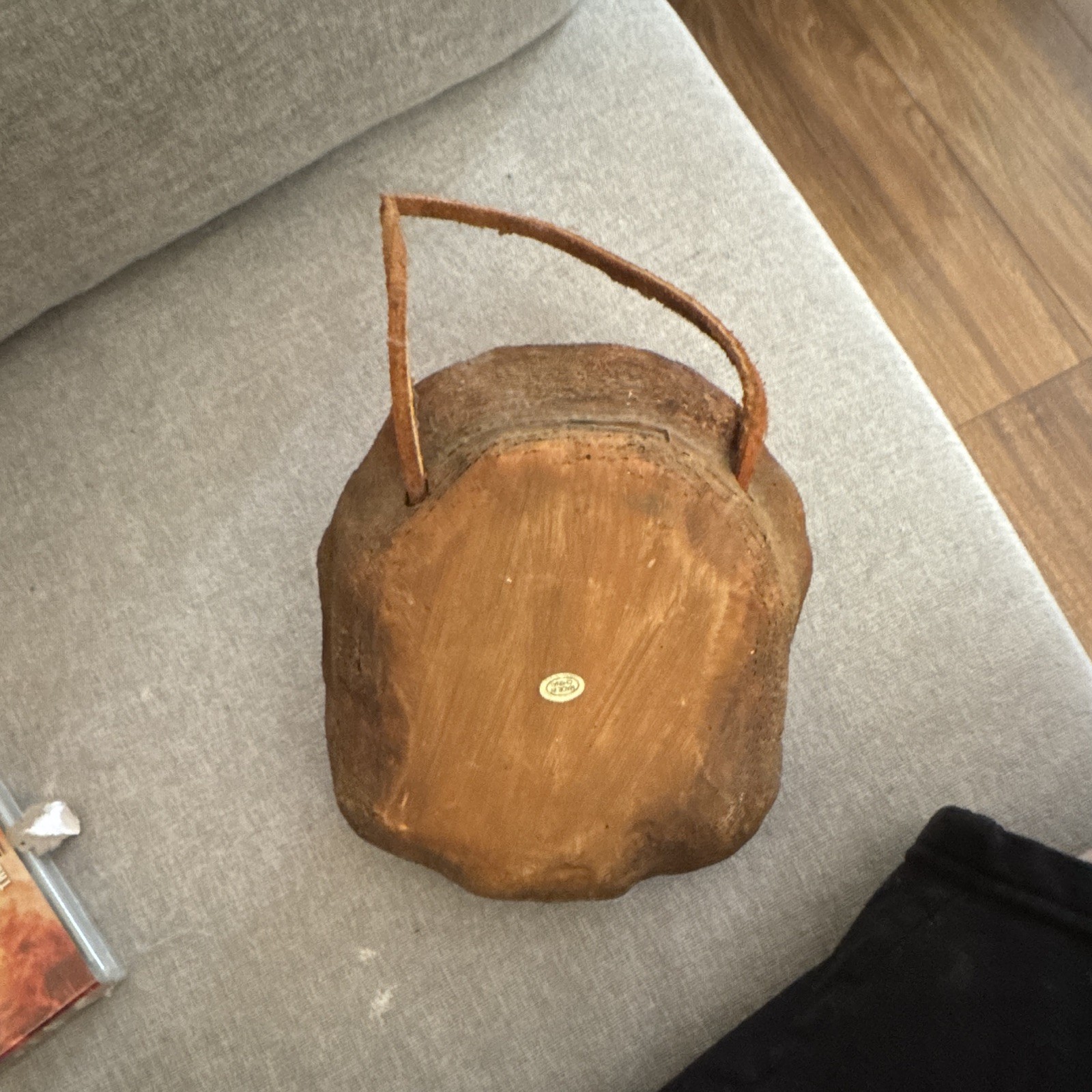 Birdhouse styled to resemble a rustic, decorative fishing hat & boot