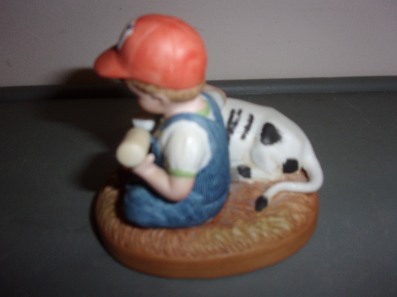 BOY BOTTLE FEEDING CALF COUNTRY STORE LITTLE FARMERS LIMITED EDITION FIGURINE
