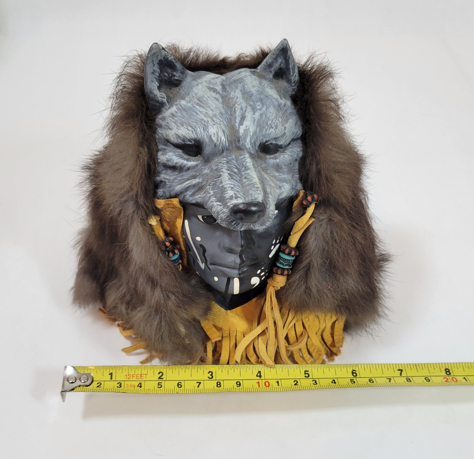 Indigenous tribal bust wolf headdress ceramic fur lining statue leather tassles