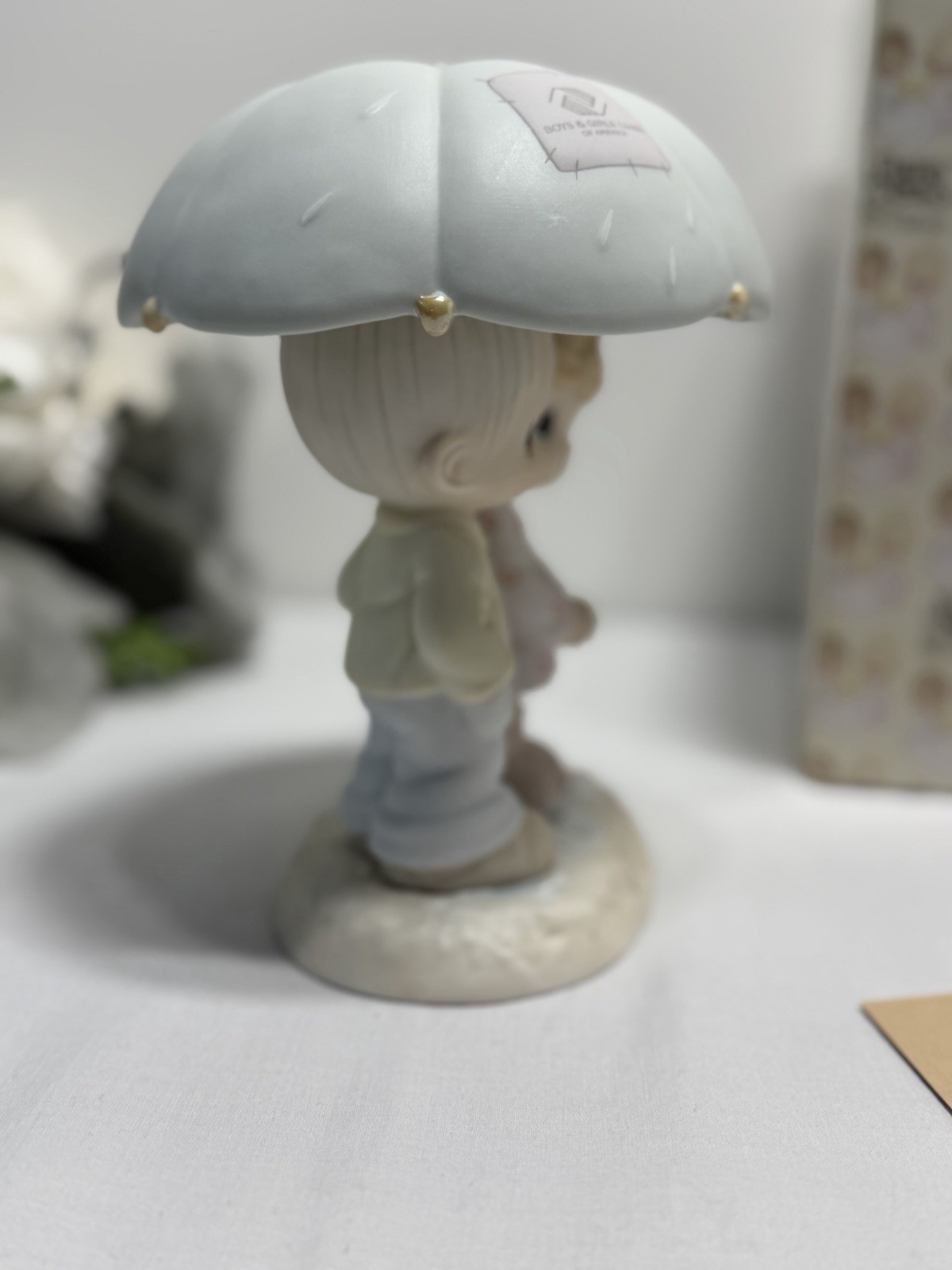 Enesco Precious Moments 523550 “He Is Our Shelter From The Storm”
