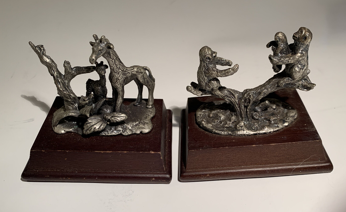 Pair of miniature animal figurines metal on wood base Giraffes Monkeys
