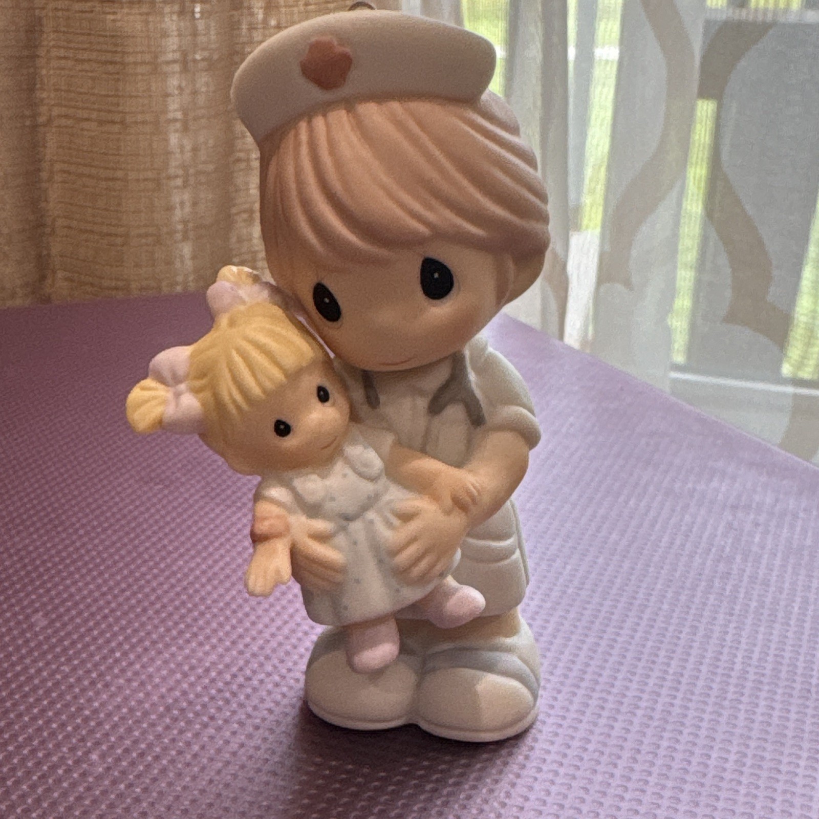 Precious Moments Nurse Figurine Comforting Heart Design