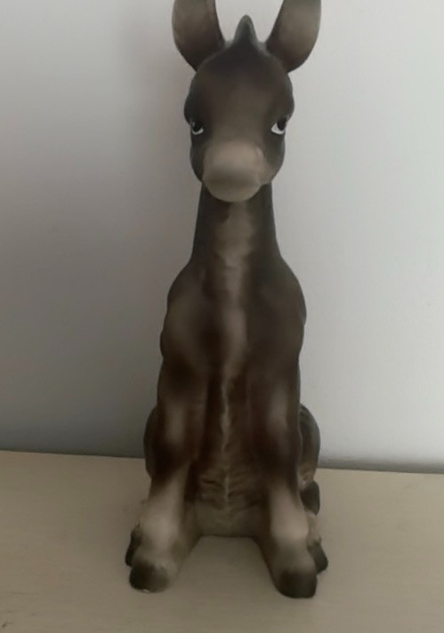 CUTE PORCELAIN DONKEY FIGURINE BY UCAGCO. ABOUT 9″ HIGH.