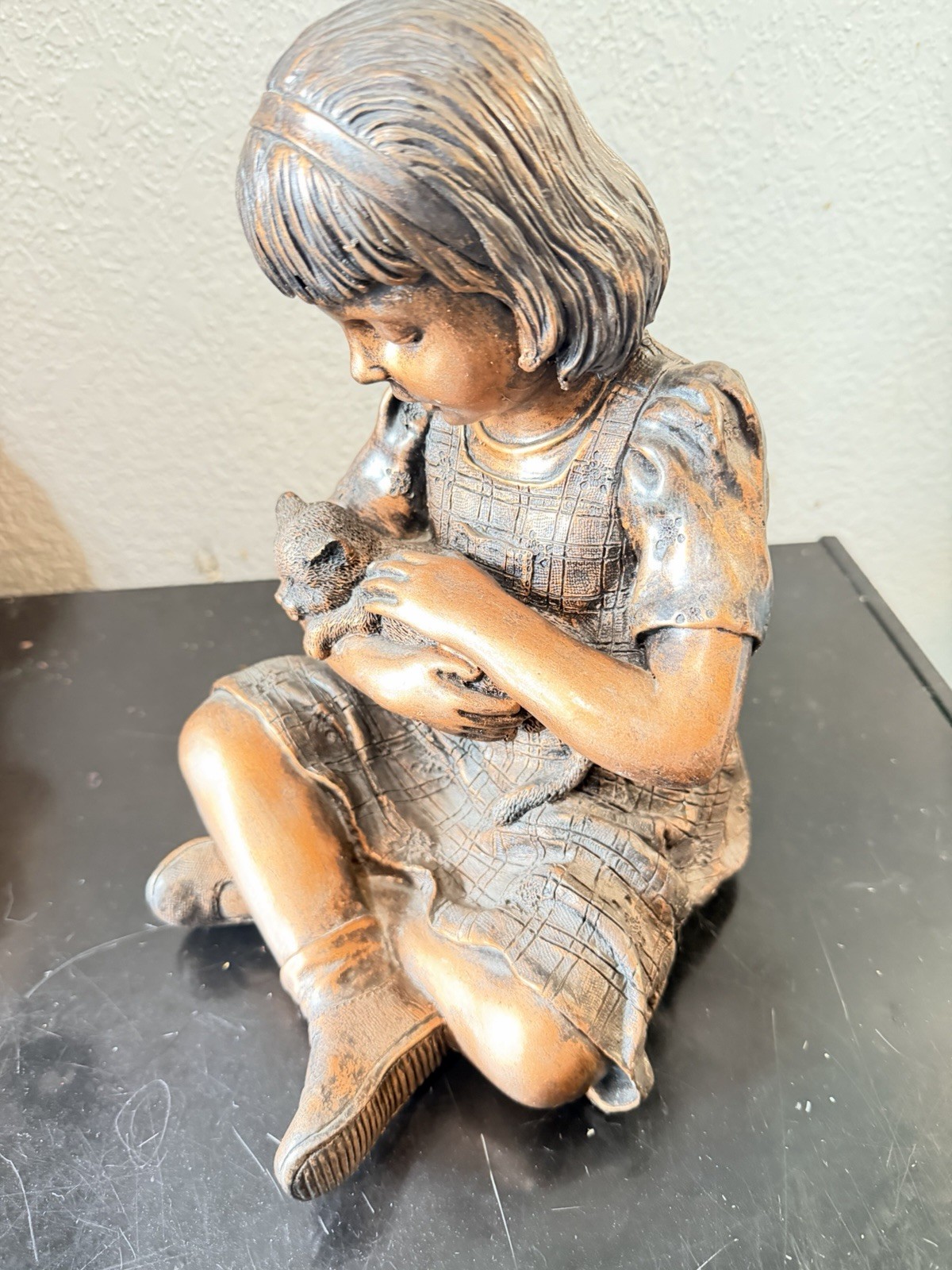 Vintage girl holding kitten bronze finished resin cast sculpture