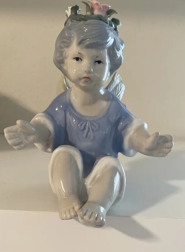 Glazed Porcelain Cherub Angel Boy 5” Tall, sitting. In great condition.