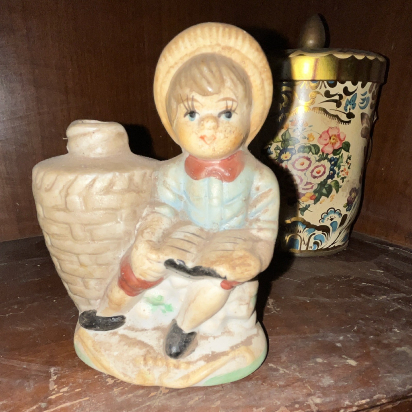 Hand Painted Ceramic Figurine Person with Basket Beige Red Blue Black Decor