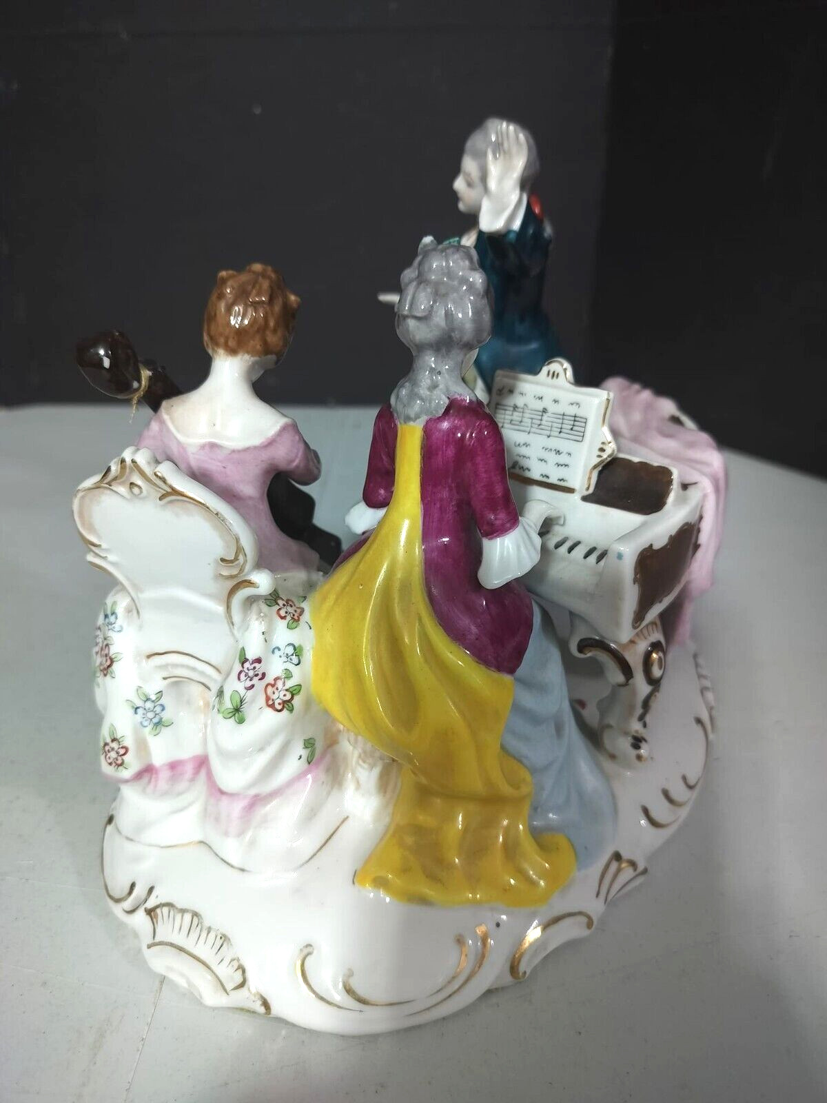 Antique Continental Porcelain Figurine Group, 7″ x 8.5″.