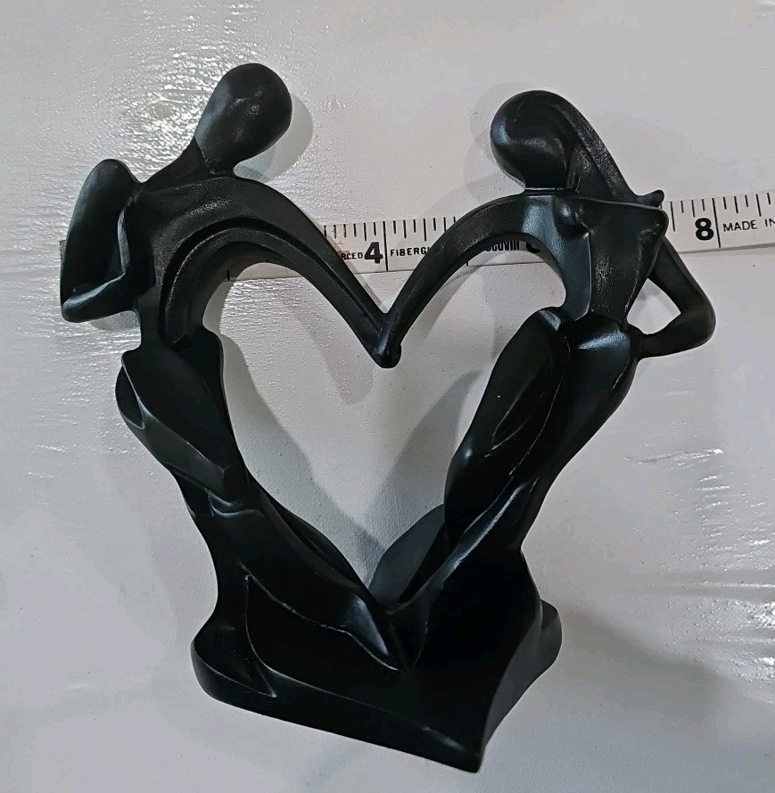 Couple Celebrates Love With Dance – 7”x7.5”x4” Black Heart Shape