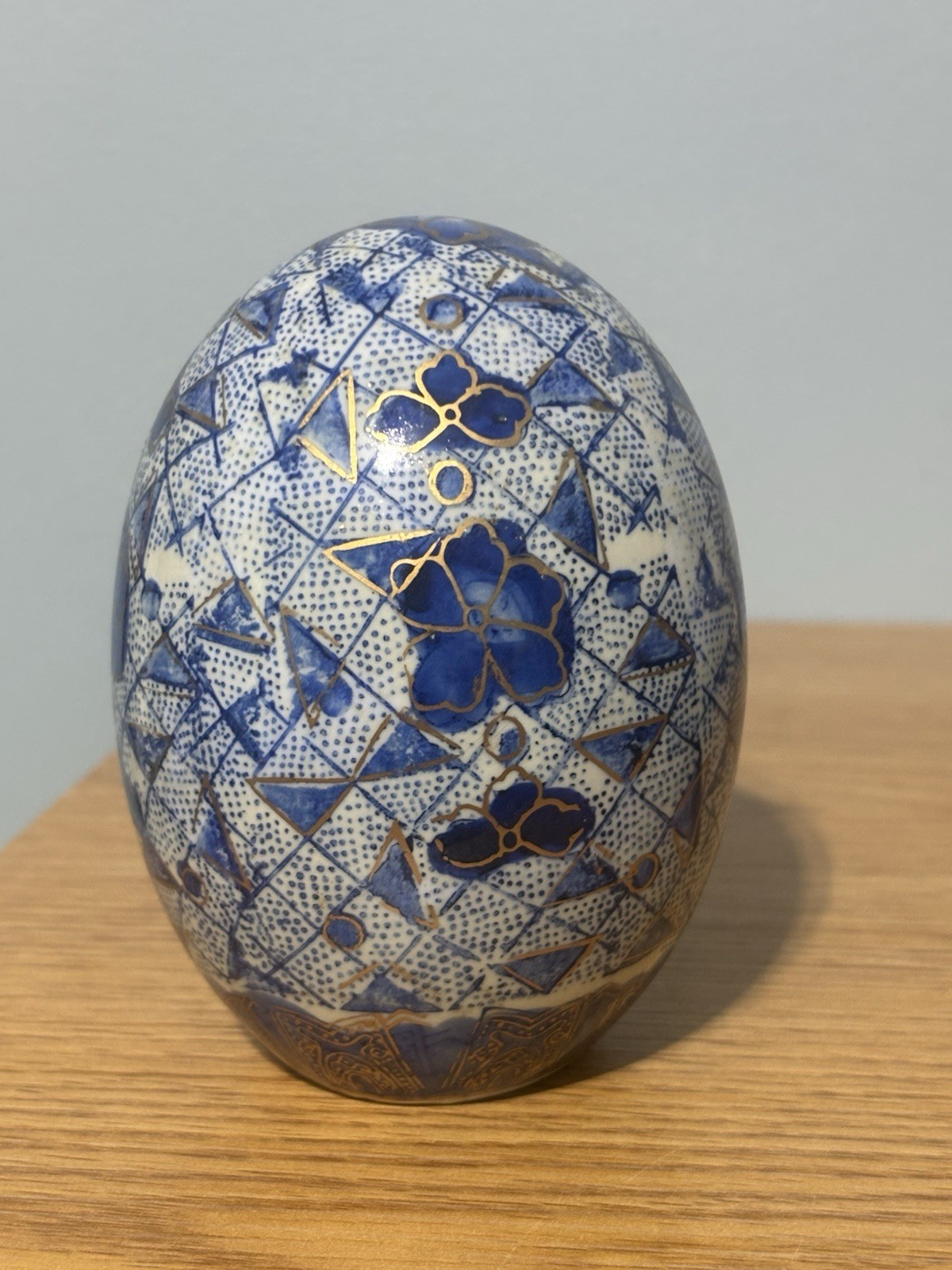 Decorative Porcelain Or Ceramic Egg with Geometric Shapes And Gold Accents