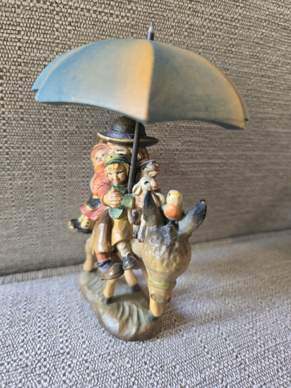 “Riding Through the Rain” Ferrandiz wood carving