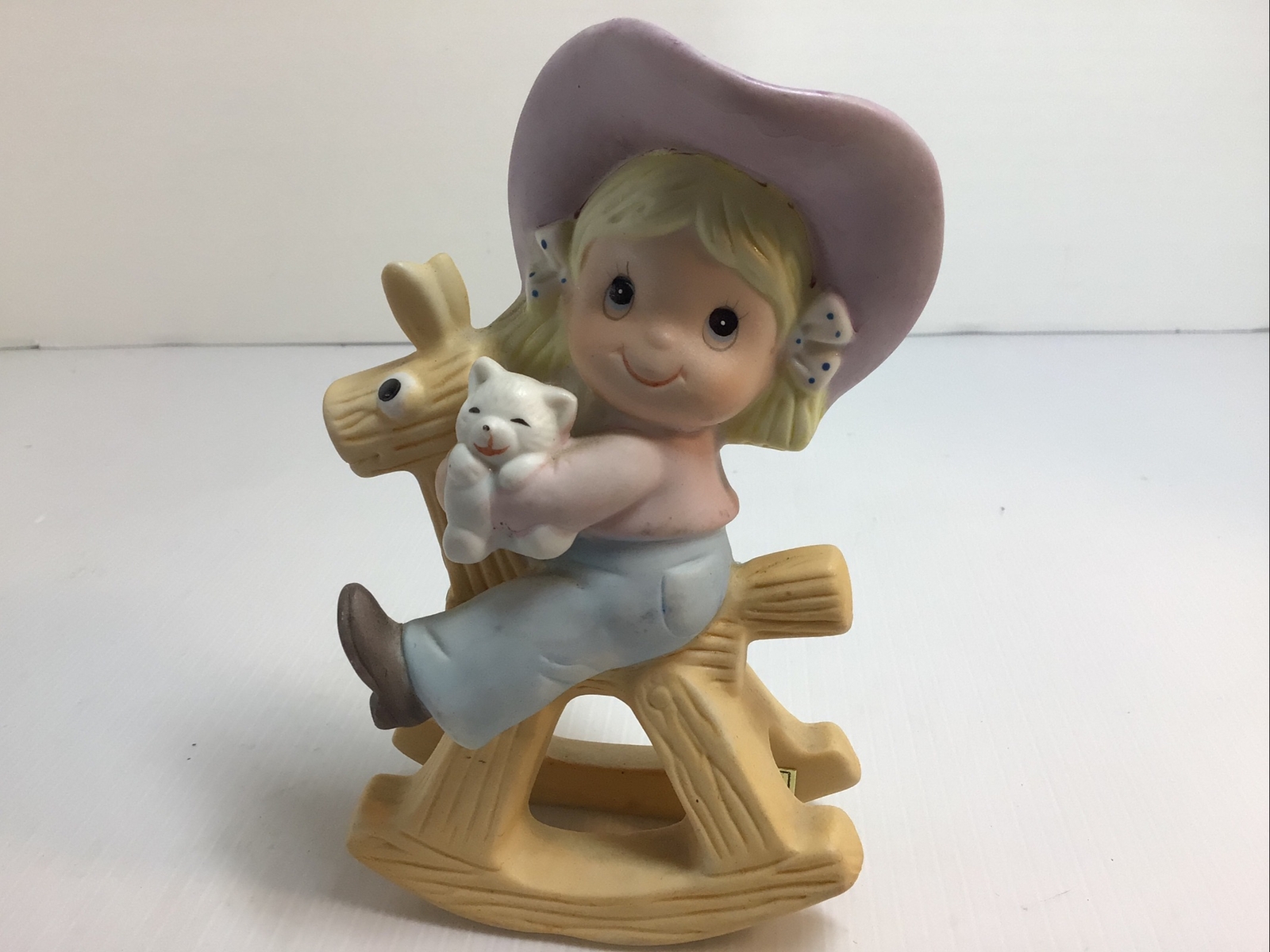 Homeco Cowgirl riding hobby horse ,#1417. no box, 5 inches tall.