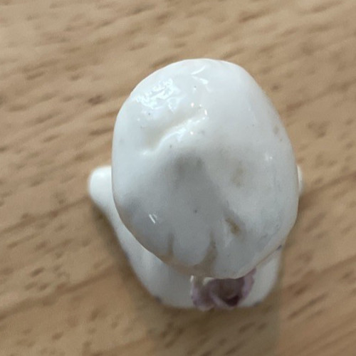 Vintage Miniature Baby Bone ChinaFigurine Hold Flowers Symbol N 1-3/4 inch Tall