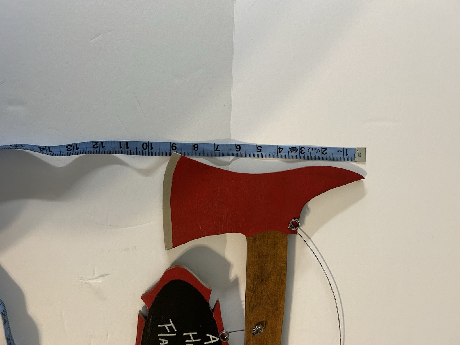 Whimsical Fire Axe With Signage Attached