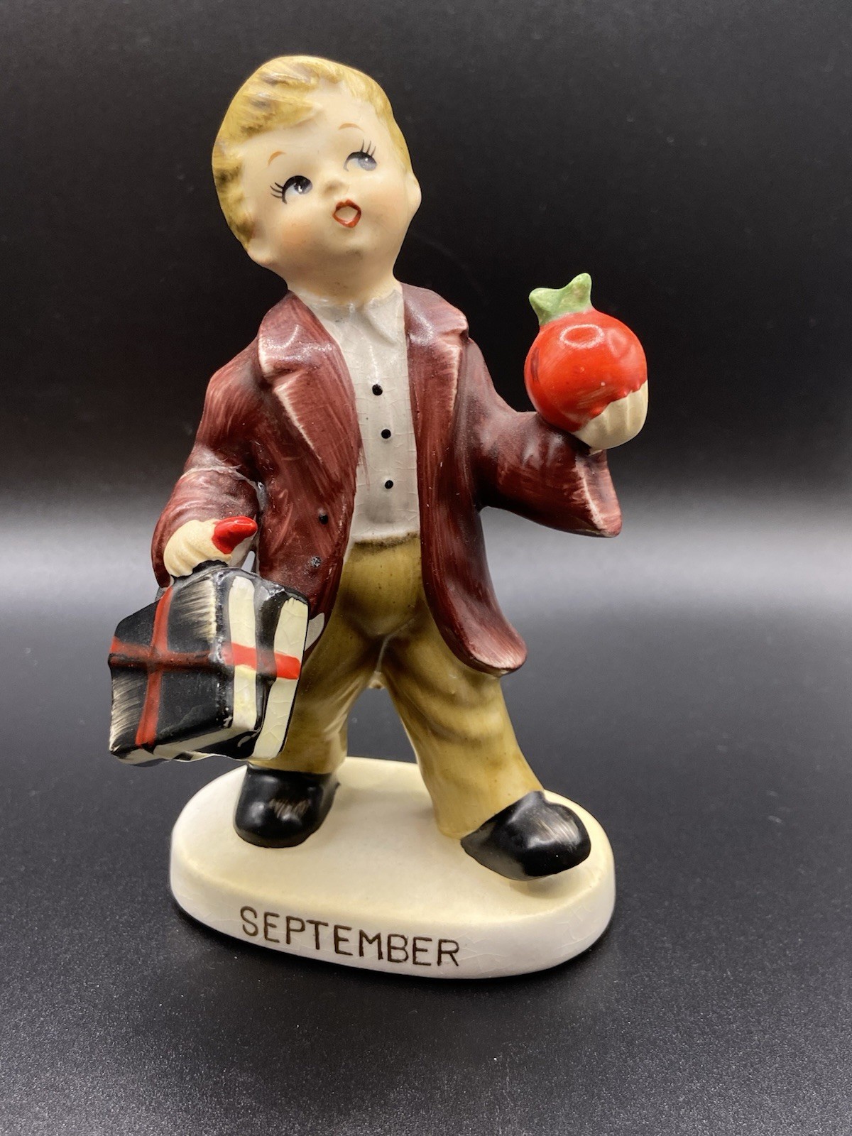 VTG LEFTON SEPTEMBER SCHOOL BOY FIGURINE CARRYING APPLE AND BOOKS #2300