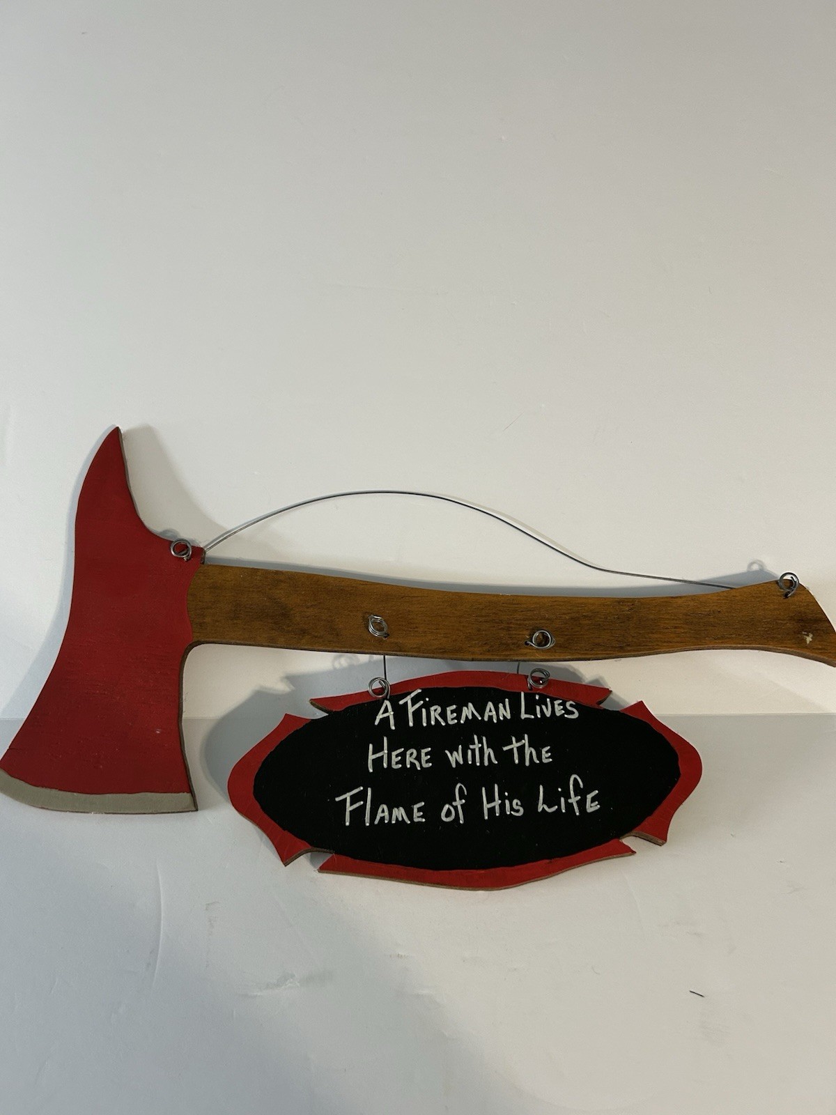 Whimsical Fire Axe With Signage Attached