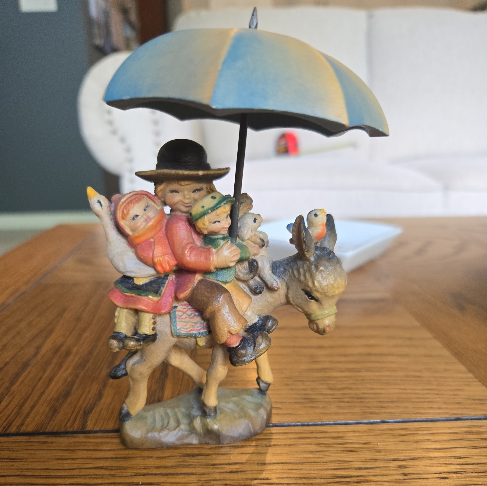 “Riding Through the Rain” Ferrandiz wood carving