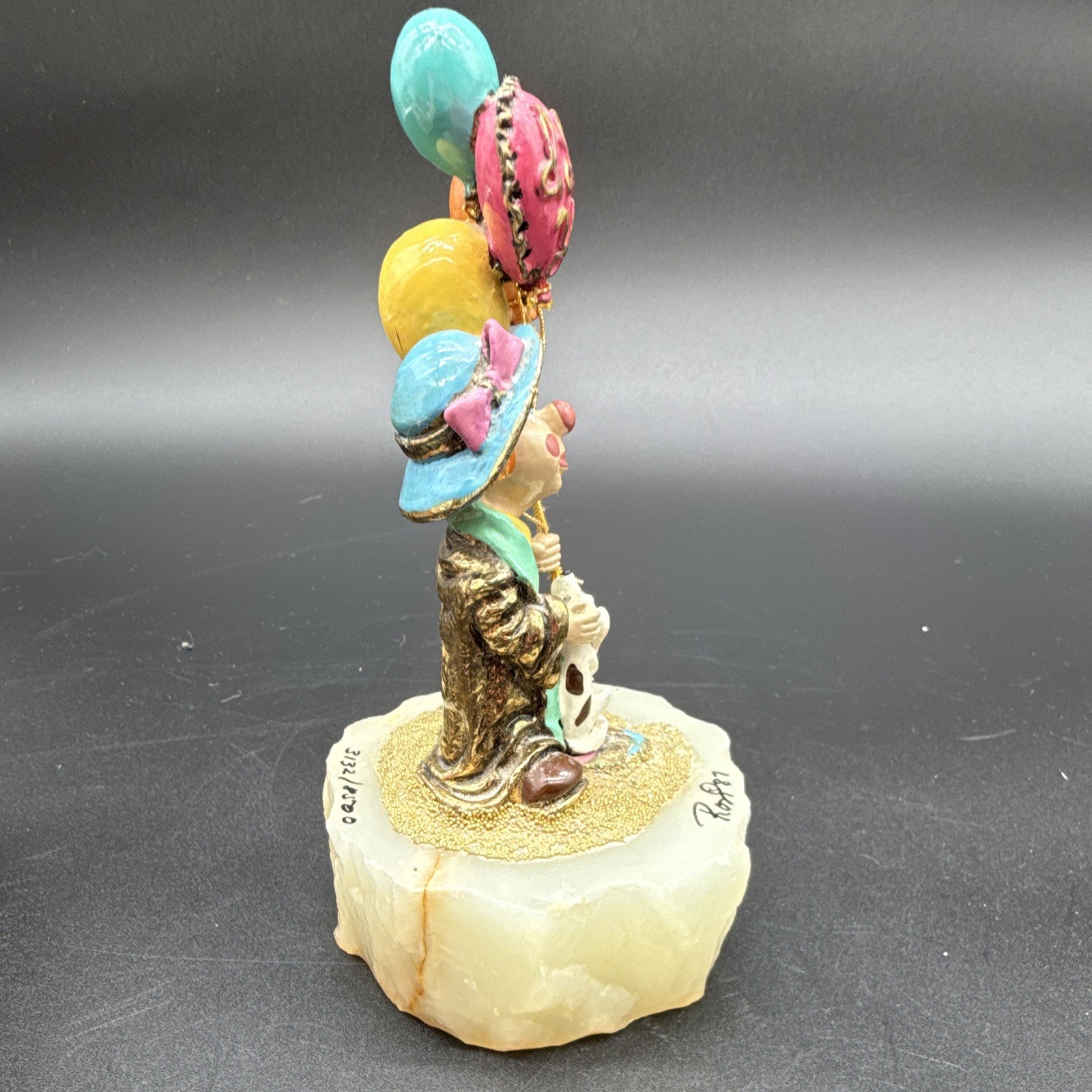 Ron Lee signed hand-painted clown figurine with balloons on stone base, 1987