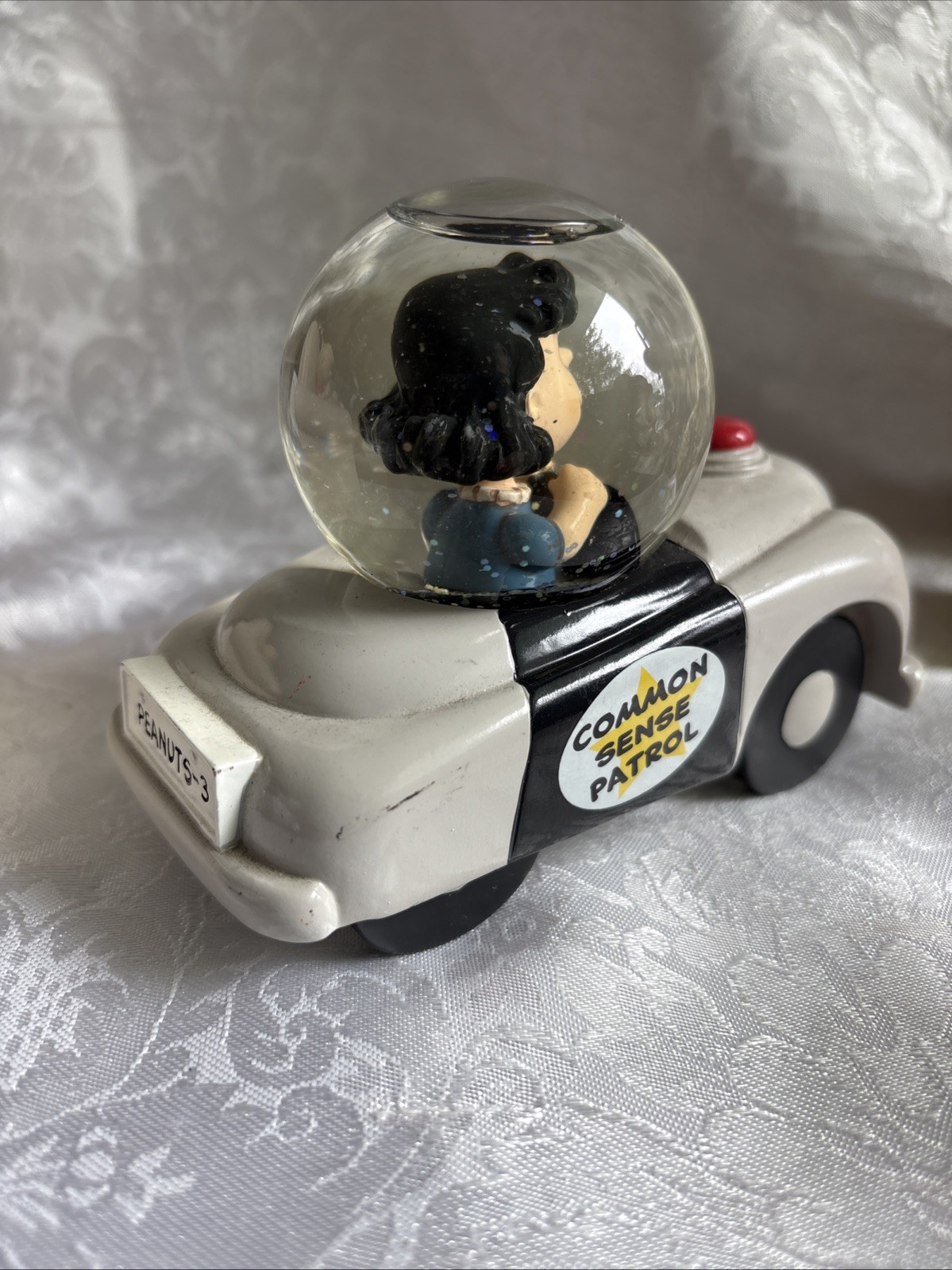 2013 Hallmark Peanuts Gallery Lucy Driving Common Sense Patrol Car Snow Globe
