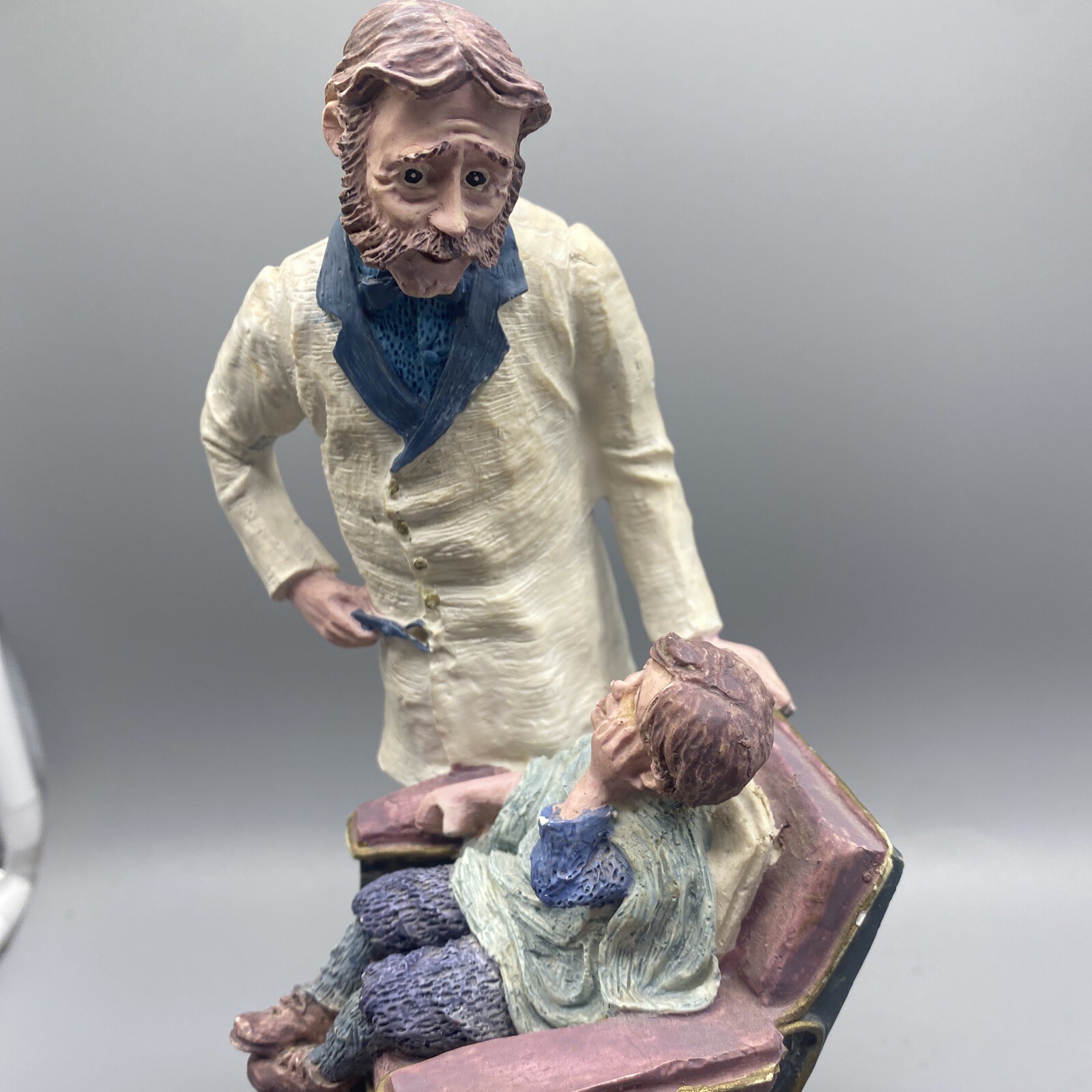 Dentist D.D.S. Pulling Tooth in Chair Resin Figurine on Wood Base READ CONDITION