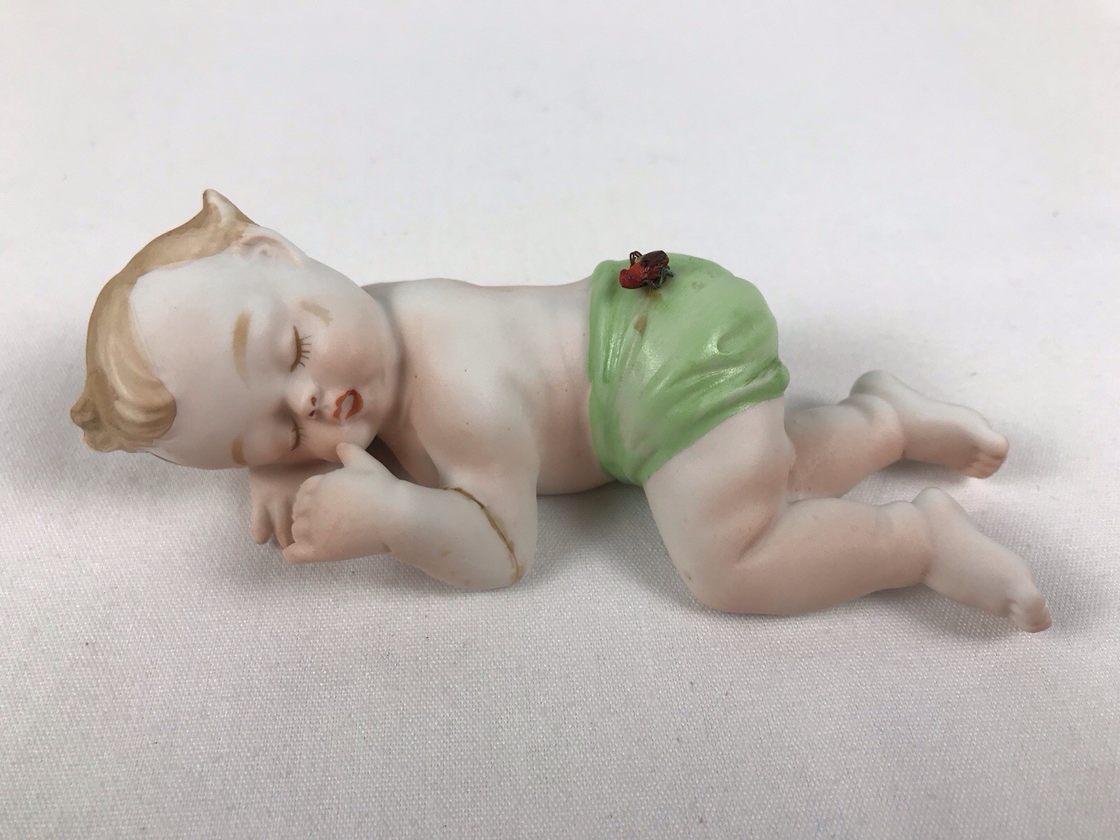 Vintage Bisque Sleeping Piano Baby w/ Bug On Butt Green Bottoms Hand Painted