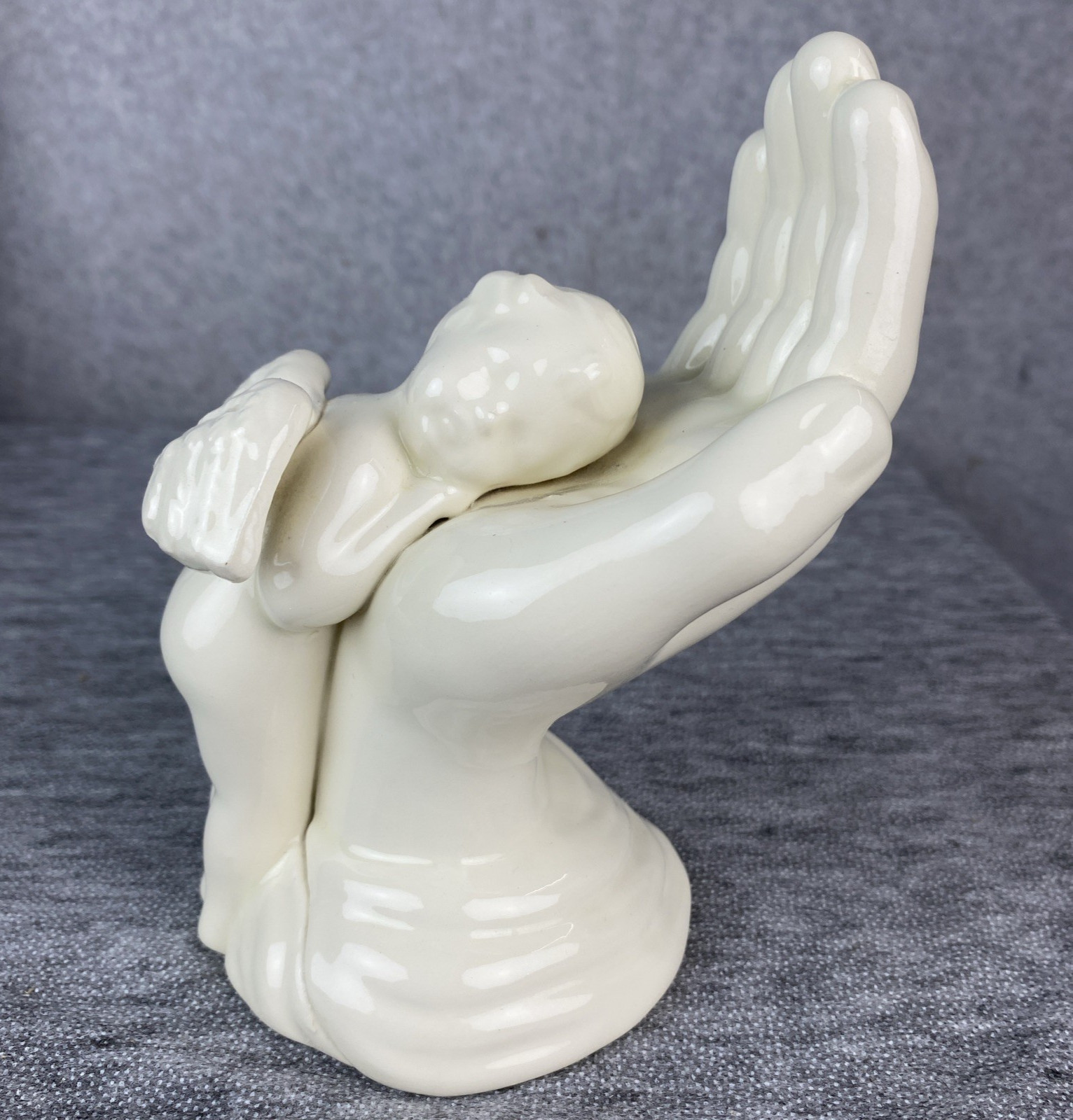 Ceramic Sleeping Cherub On The Hand of God Angel White Shiny Glaze