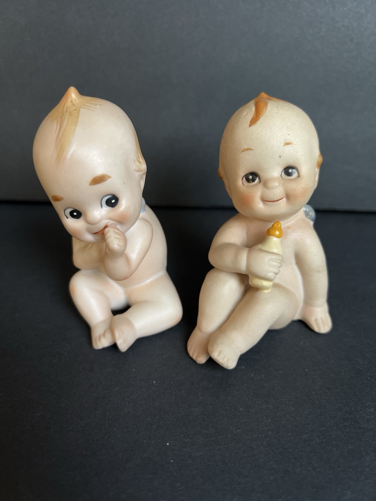 Lefton Kewpies Set of 2 Bisque Piano Baby with Blue Wings Different Poses